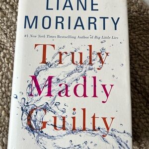 Truly Madly Guilty by - White Cover